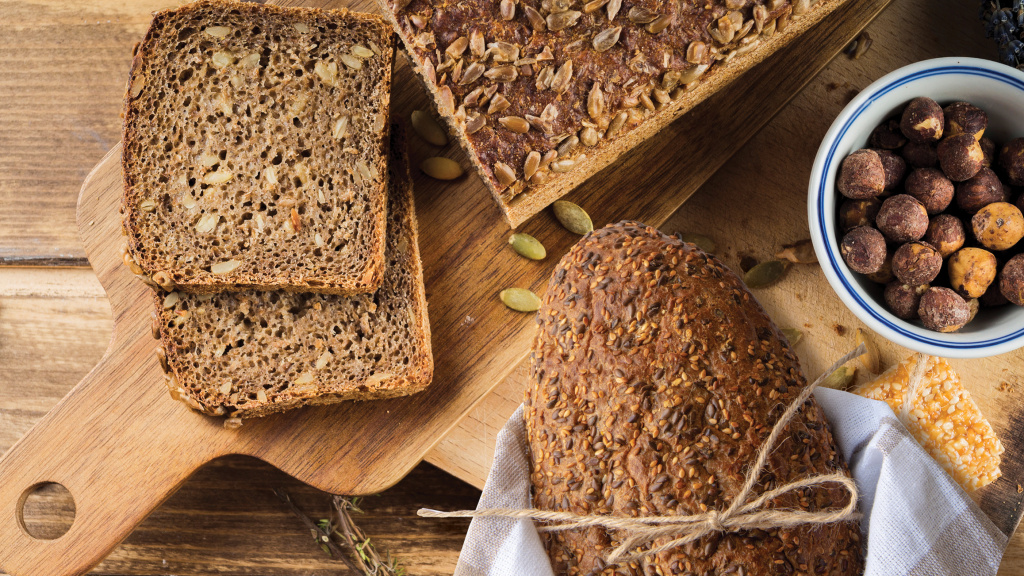 healthy-sunflower-seed-bread-hazelnut-bowl-with-protein-bar-chopping-board.jpg